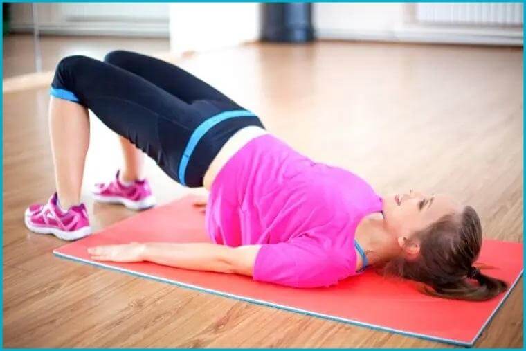 a woman performing a biofeedback physical therapy exercise