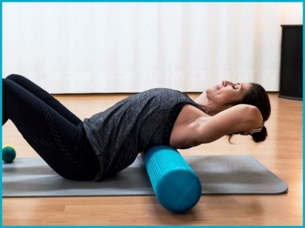 a woman performing squats with bands physical therapy exercise